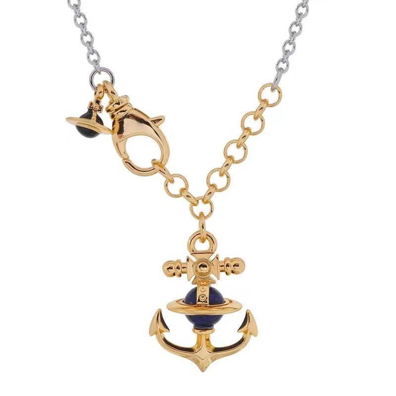 Vivienne Westwood felice two-tone gold plated Navy style sailboat anchor Saturn necklace cross