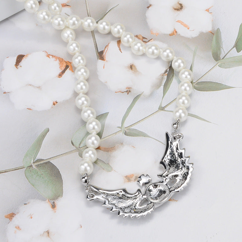Vivienne Westwood Pearl flying wings pendant necklace personality European and American punk