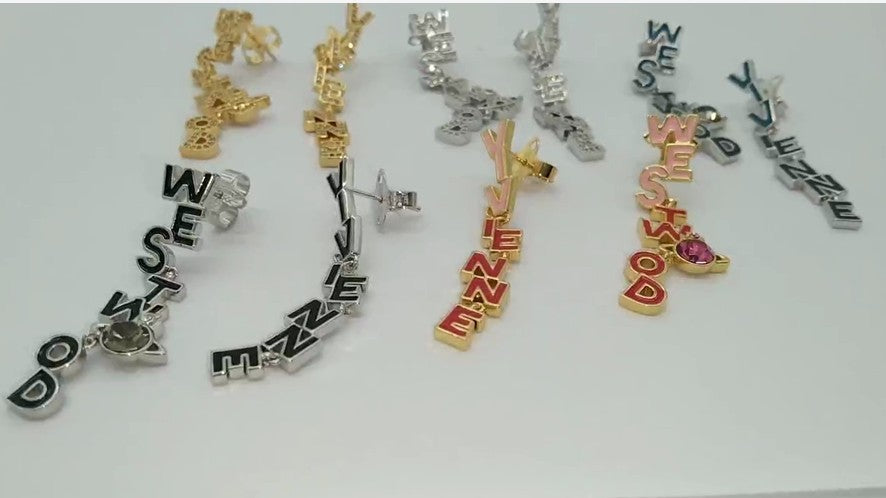 Vivienne Westwood paint asymmetric letter earrings