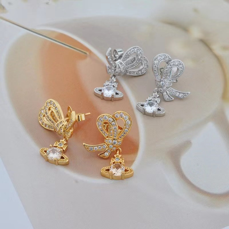 Vivienne Westwood bowknot zircon Saturn earrings