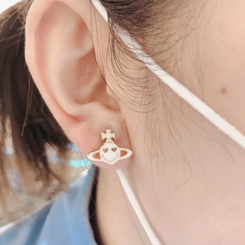 Vivienne Westwood smiley face ear studs personalized European and American punk earrings