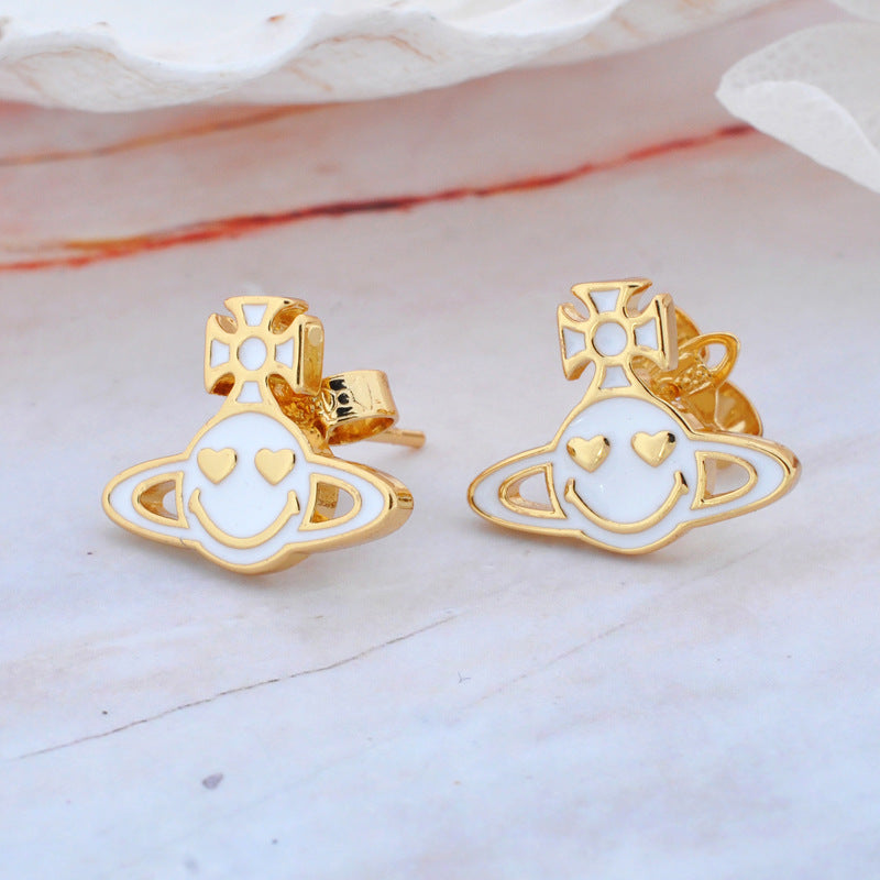Vivienne Westwood smiley face ear studs personalized European and American punk earrings