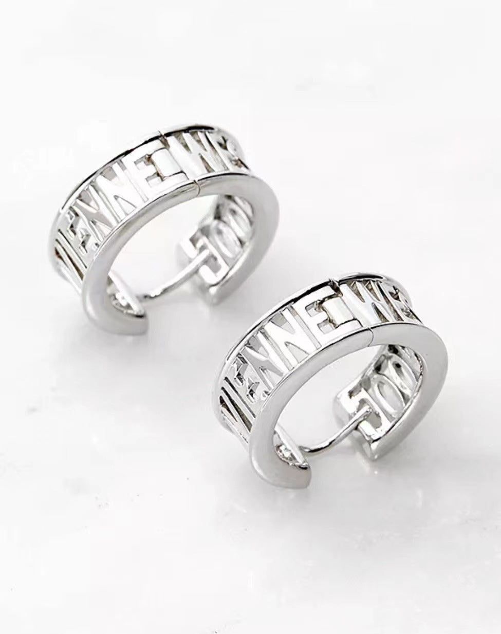 Vivienne Westwood hollow letter LOGO earrings ear studs couple models
