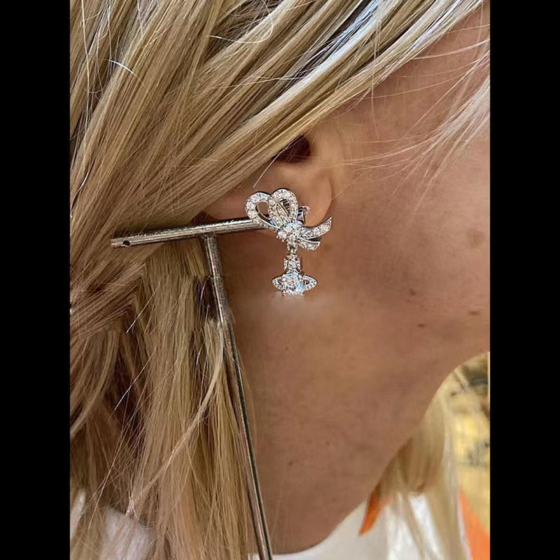 Vivienne Westwood bowknot zircon Saturn earrings