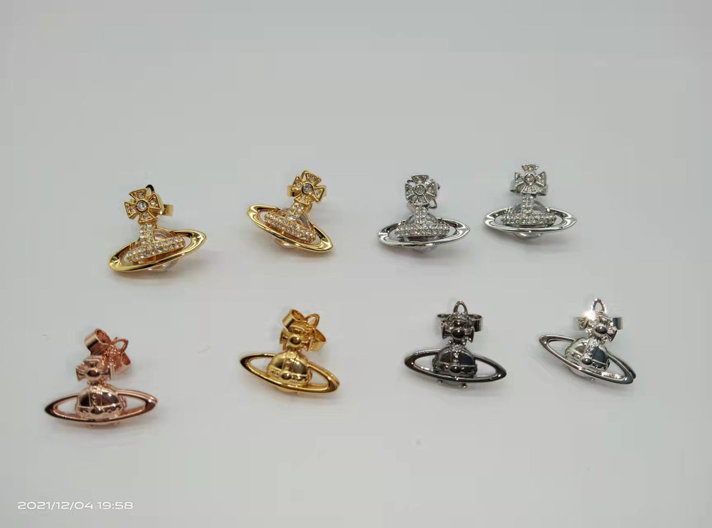 Vivienne Westwood double-sided color matching simple stud earrings
