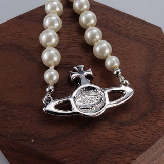 Vivienne Westwood pink paint diamond pearl bracelet college style all-match punk