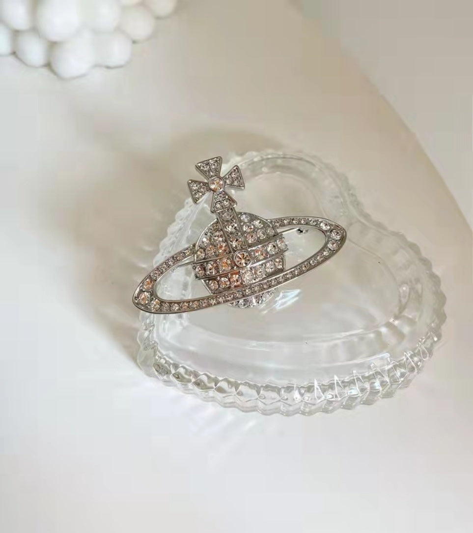 Vivienne Westwood dark red love meteor antique silver bow starry medal brooch