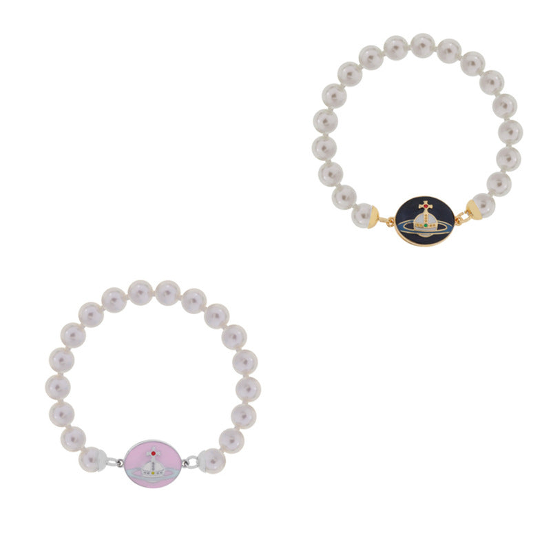 Vivienne Westwood pink paint magnetic enamel buckle pearl bracelet