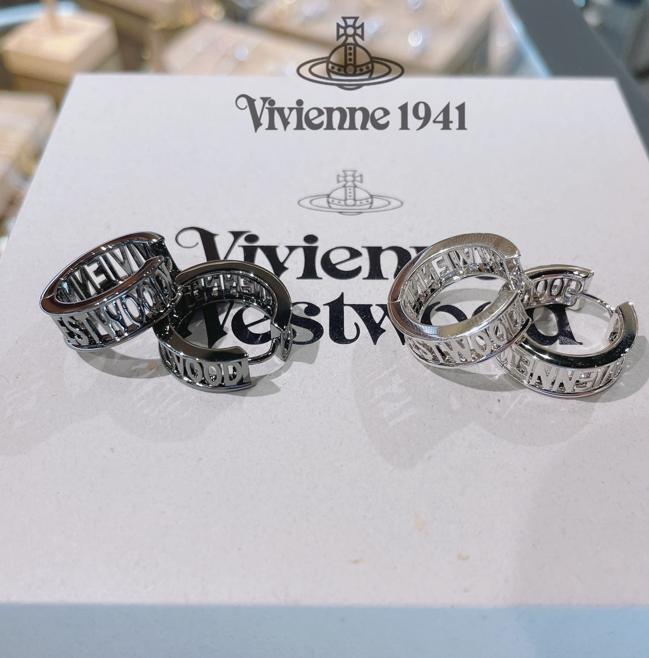 Vivienne Westwood hollow letter LOGO earrings ear studs couple models