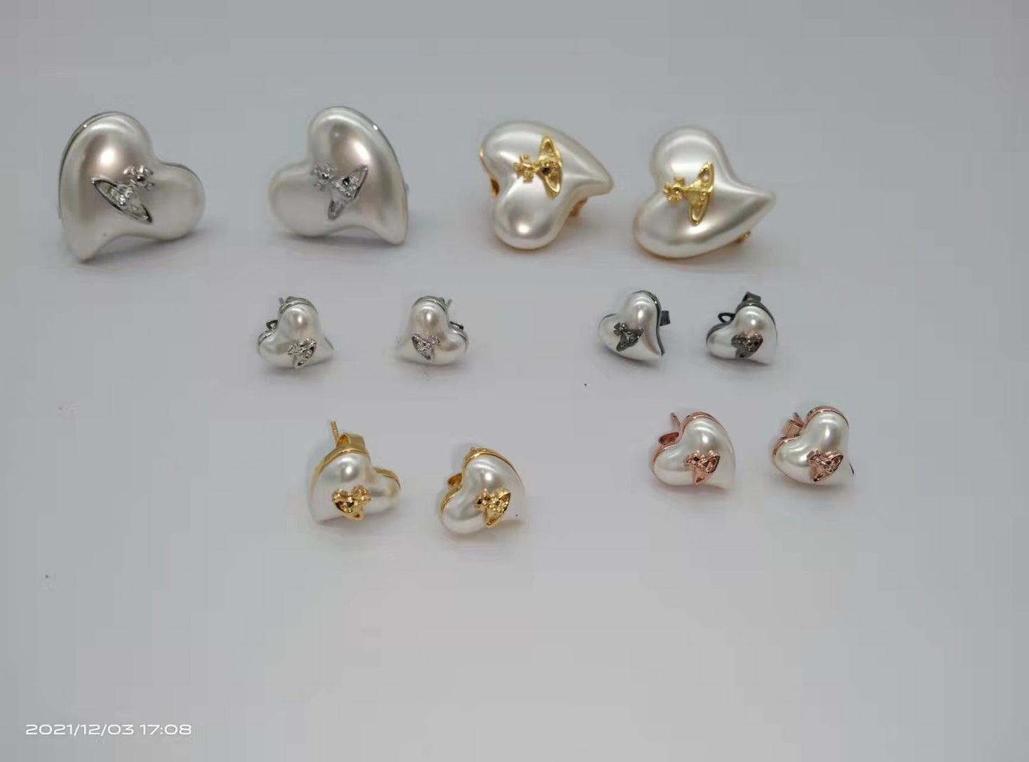 Vivienne Westwood love series epoxy stud earrings luxurious and personalized punk