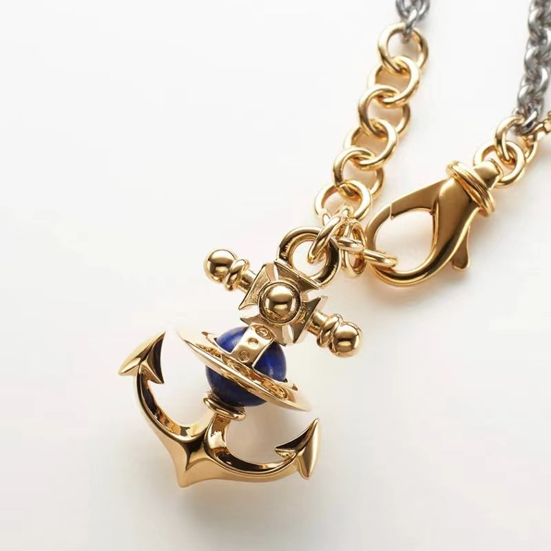 Vivienne Westwood felice two-tone gold plated Navy style sailboat anchor Saturn necklace cross