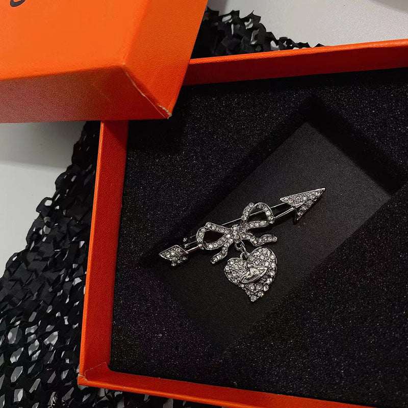 Vivienne Westwood full diamond studded heart-piercing silver brooch punk dress suit pin