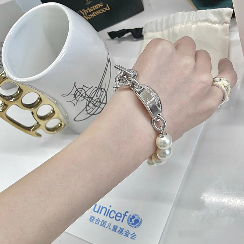 Vivienne Westwood Pearl round bracelet punk earrings couple accessories