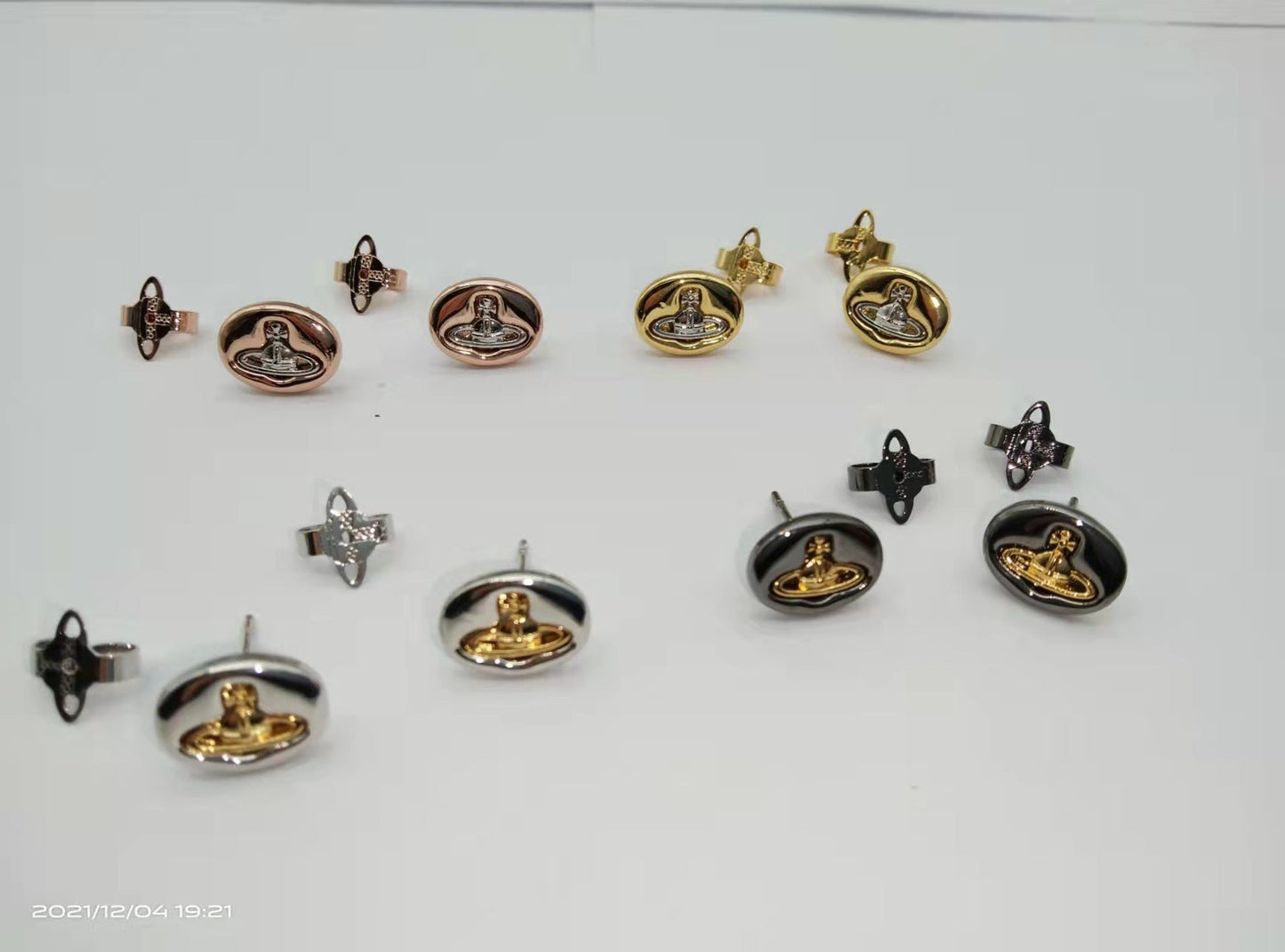 Vivienne Westwood button series stud earrings multi-color punk all-match