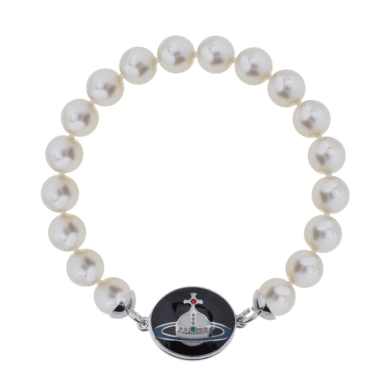 Vivienne Westwood pink paint magnetic enamel buckle pearl bracelet
