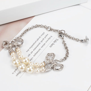 Vivienne Westwood double-layer pearl diamond bow bracelet New ins high sense