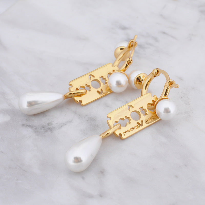 Vivienne Westwood Pearl Blade series earrings light luxury all-match punk