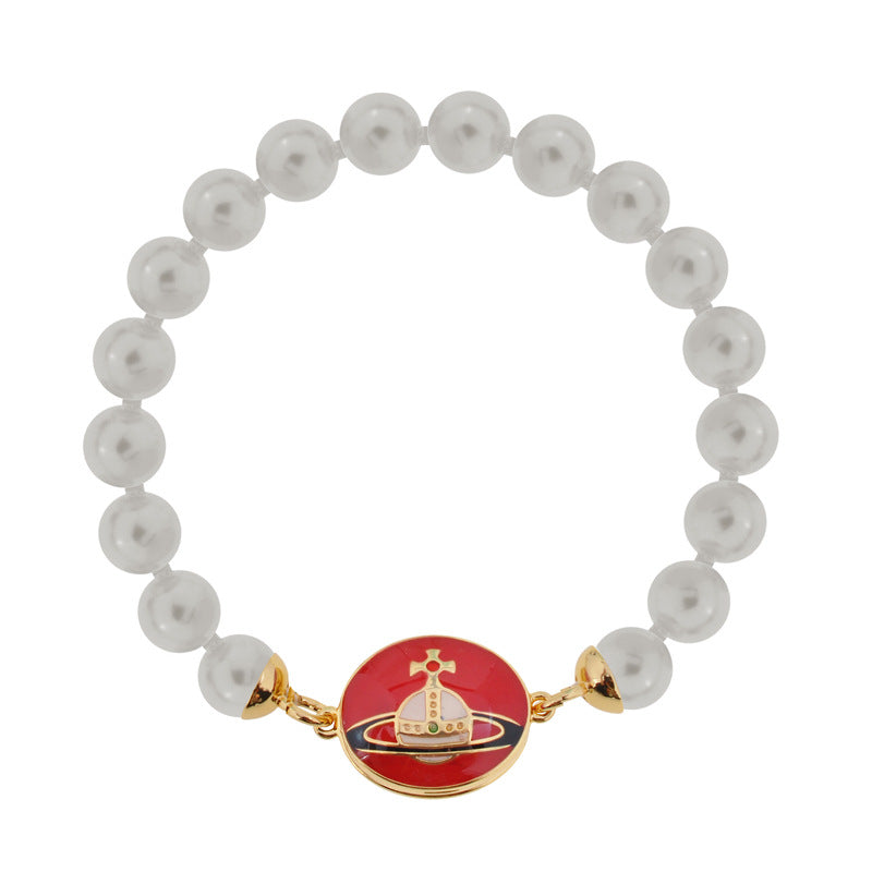Vivienne Westwood pink paint magnetic enamel buckle pearl bracelet