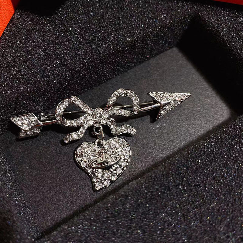 Vivienne Westwood full diamond studded heart-piercing silver brooch punk dress suit pin