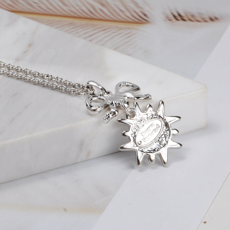 Vivienne Westwood butterfly medal pendant