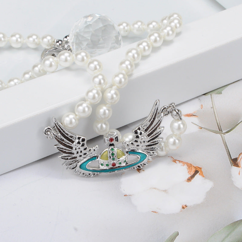 Vivienne Westwood Pearl flying wings pendant necklace personality European and American punk
