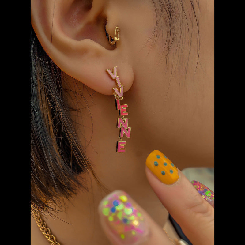 Vivienne Westwood paint asymmetric letter earrings