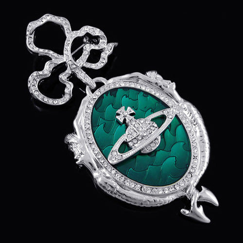 Vivienne Westwood dark red love meteor antique silver bow starry medal brooch