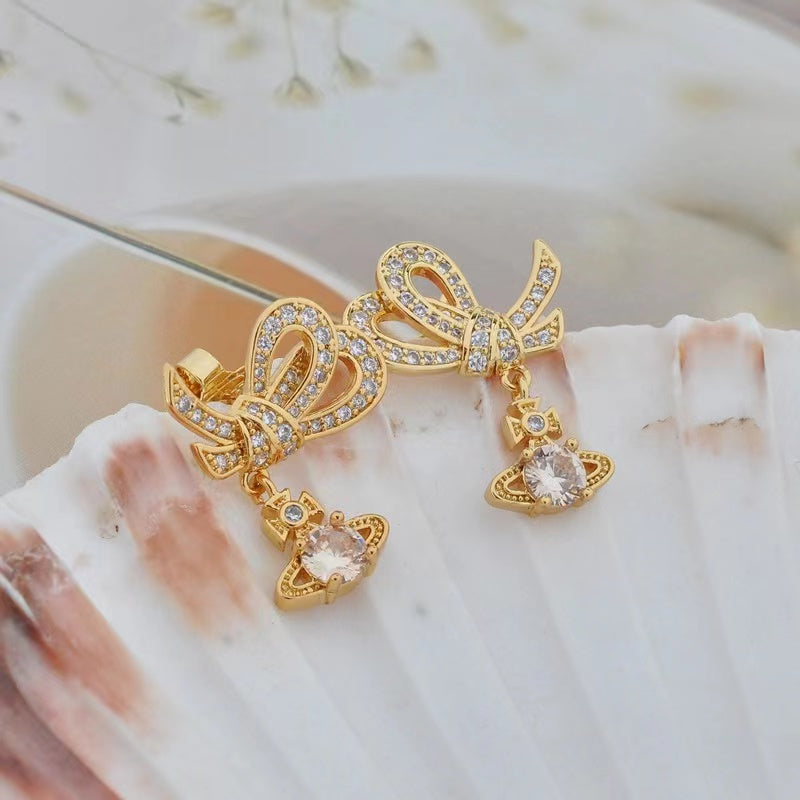 Vivienne Westwood bowknot zircon Saturn earrings