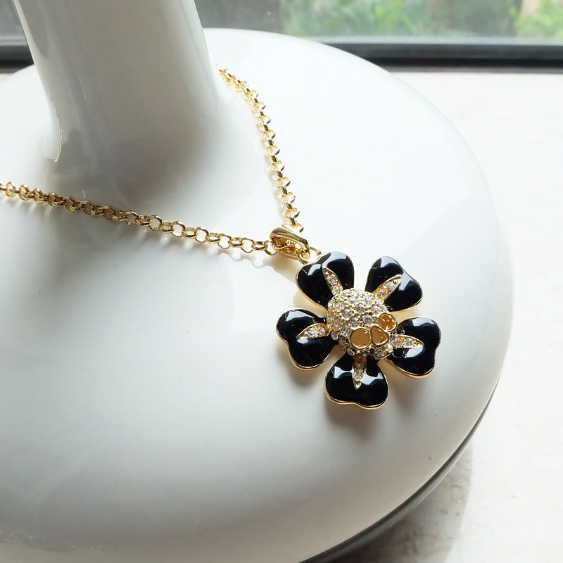 Vivienne Westwood five petal flower paint skull necklace European and American Instagram mesh Red fashion