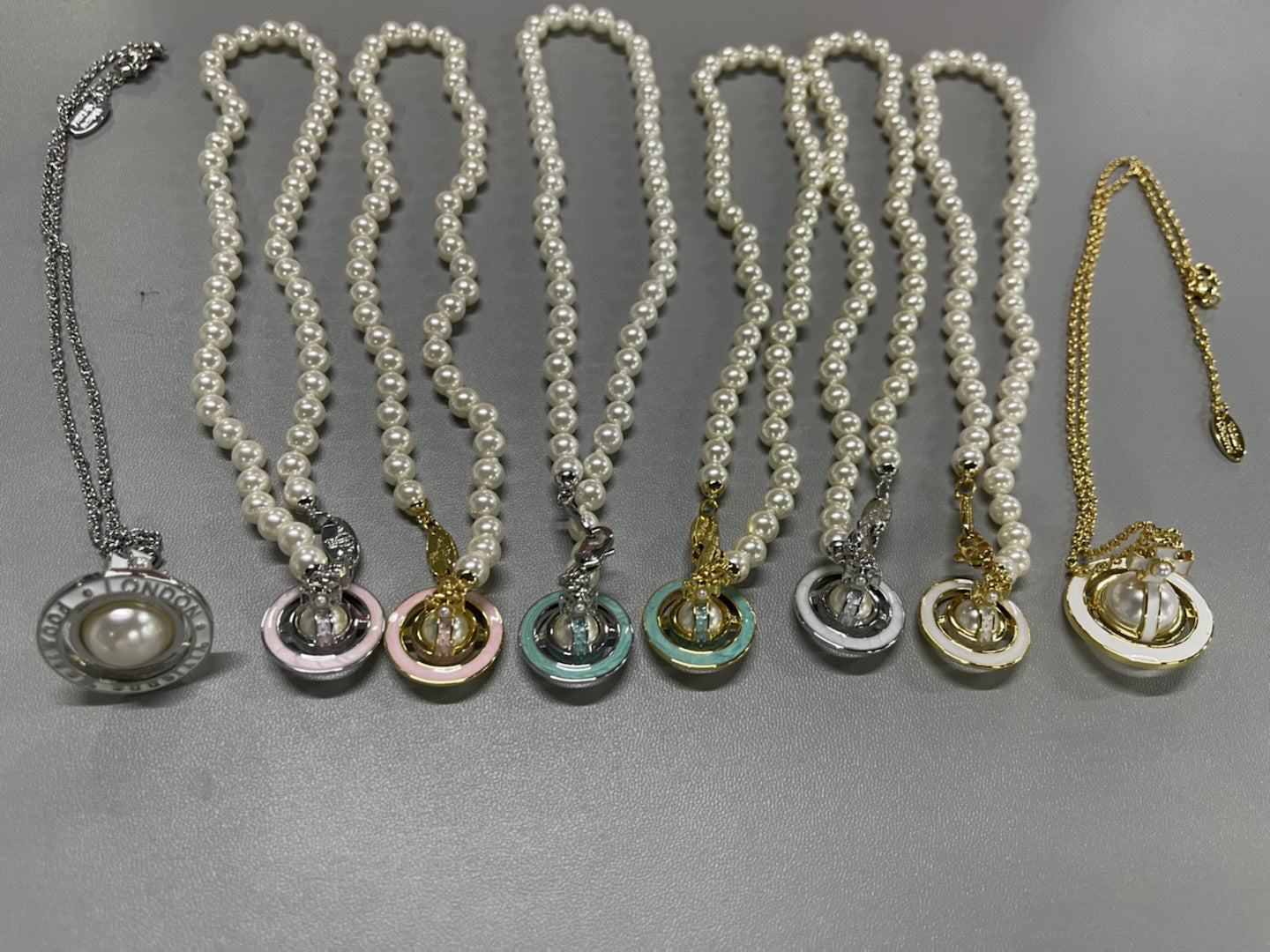 Vivienne Westwood stereo glue orb pendant