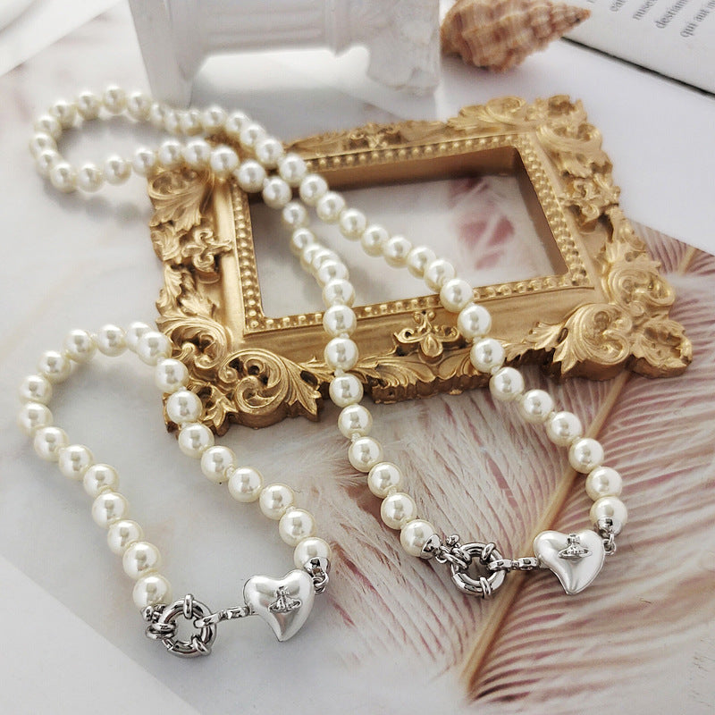 Vivienne Westwood big pearl heart necklace