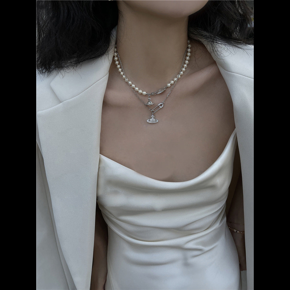 Vivienne Westwood stereo glue orb pendant