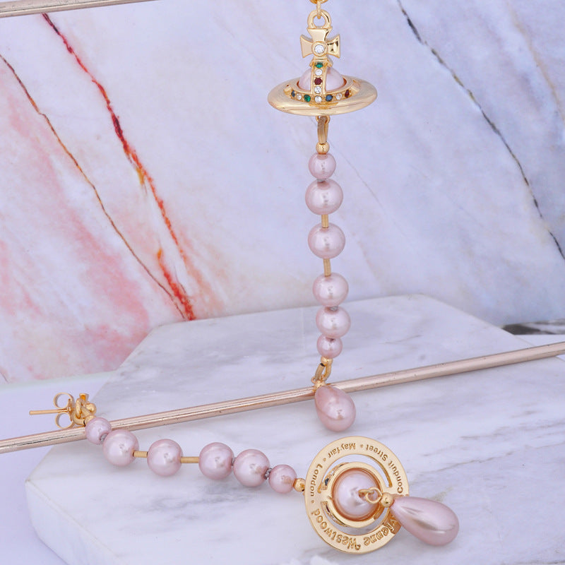 Vivienne Westwood asymmetric broken pearl earrings three-dimensional earrings