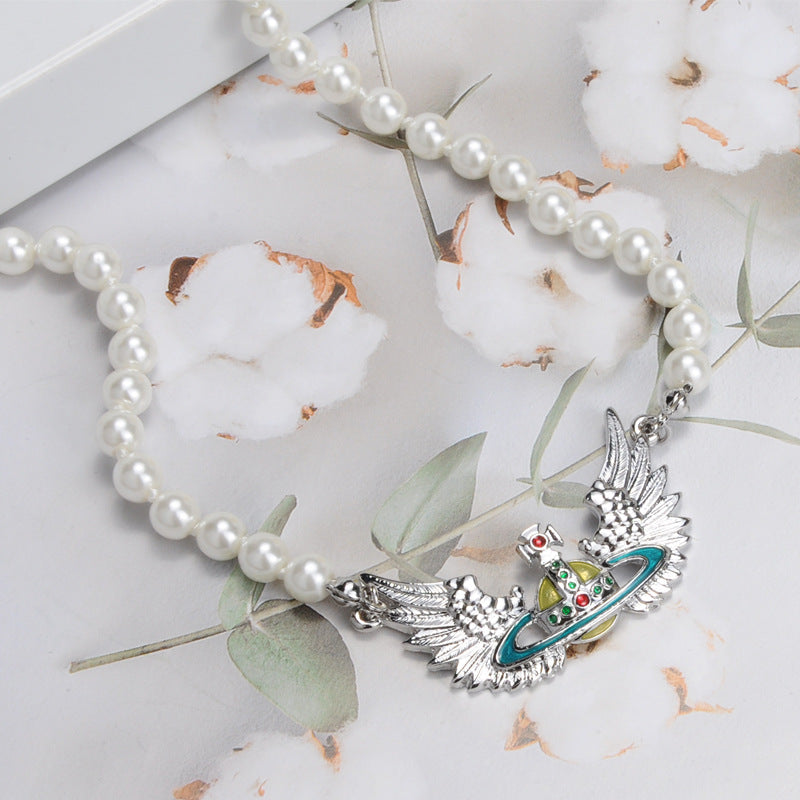 Vivienne Westwood Pearl flying wings pendant necklace personality European and American punk