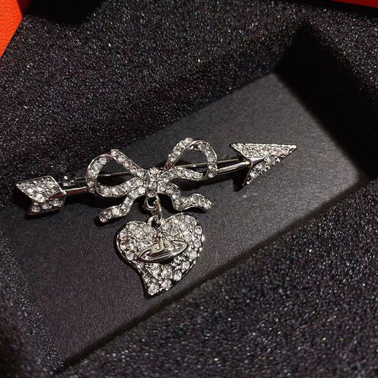 Vivienne Westwood full diamond studded heart-piercing silver brooch punk dress suit pin